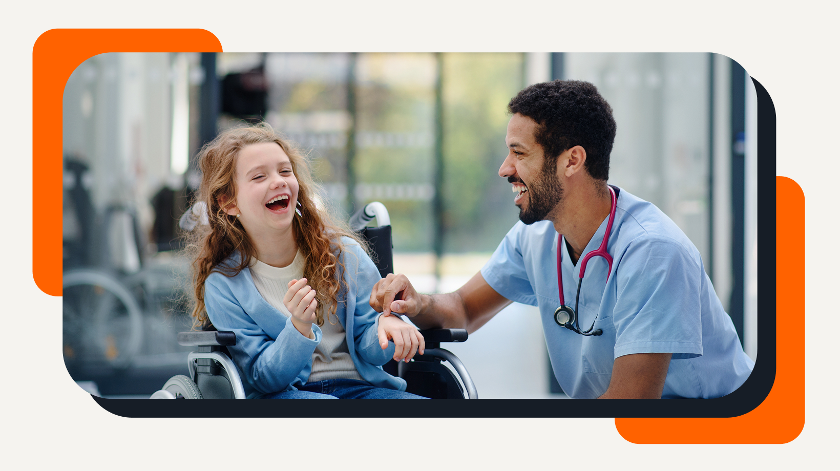 healthcare professional and patient laughing