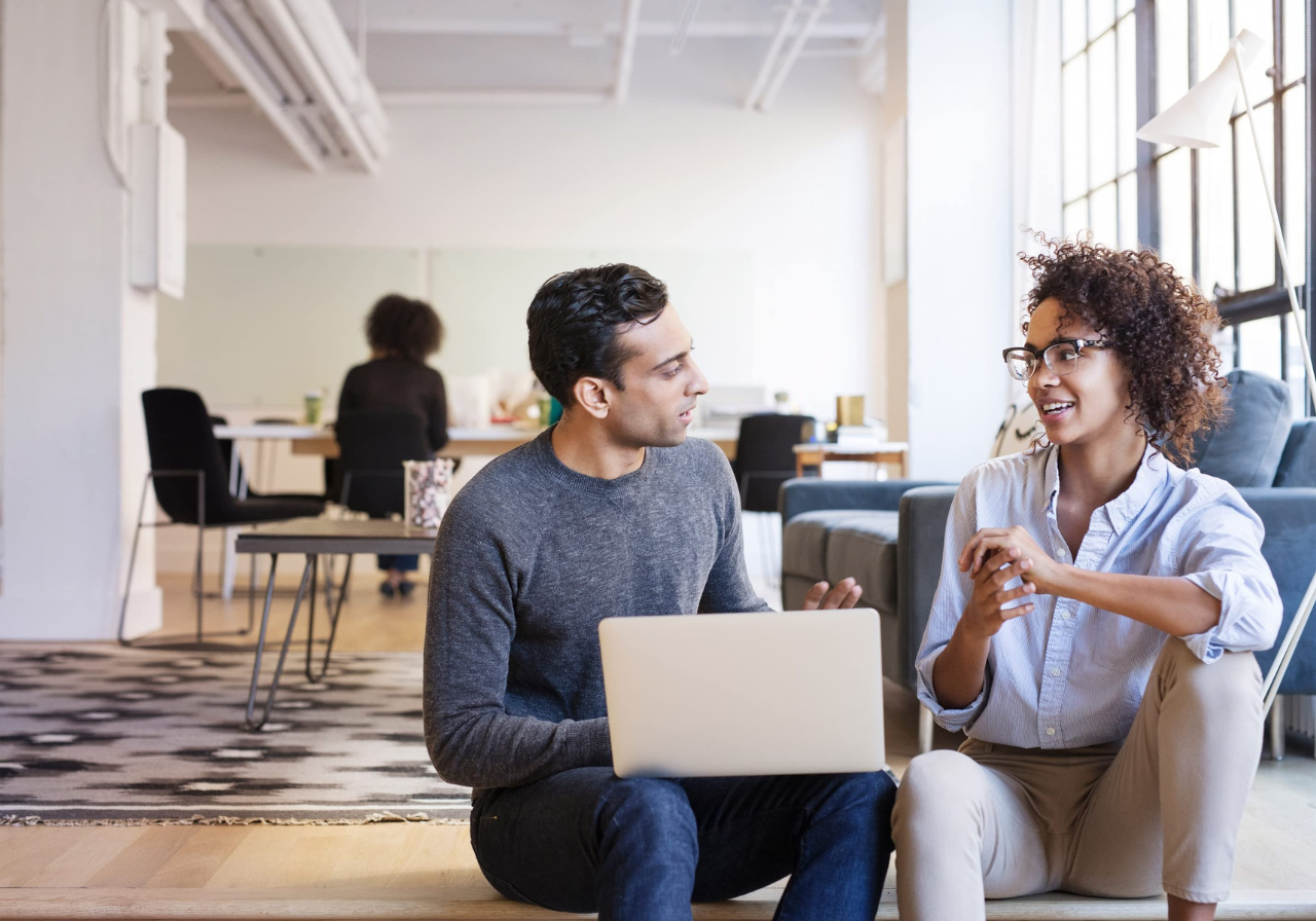 coworkers discussing